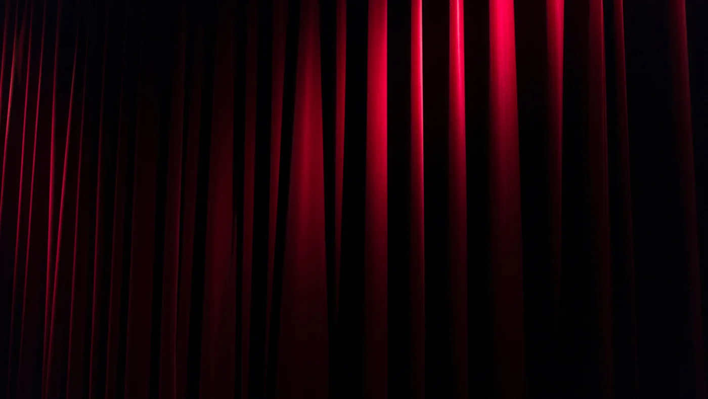 A red velvet theatre curtain for the play Siddal, orchestral music by Santiago Bianchi